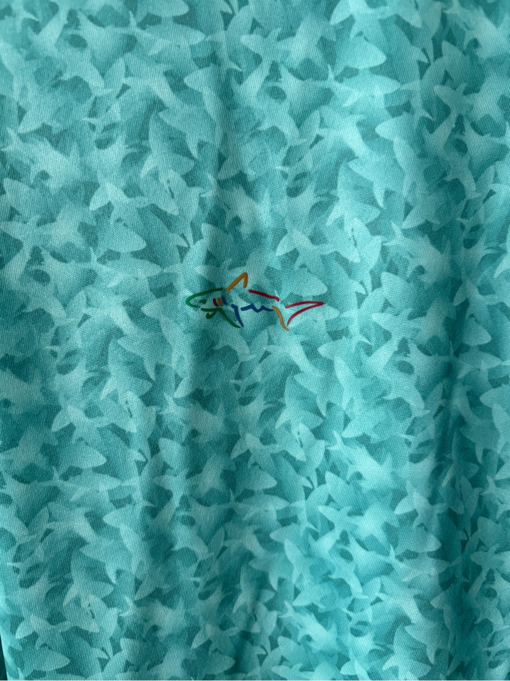 Greg Norman Collection men's golf polo shirt, with a mint colorway with sharks - Picture 2 of 3